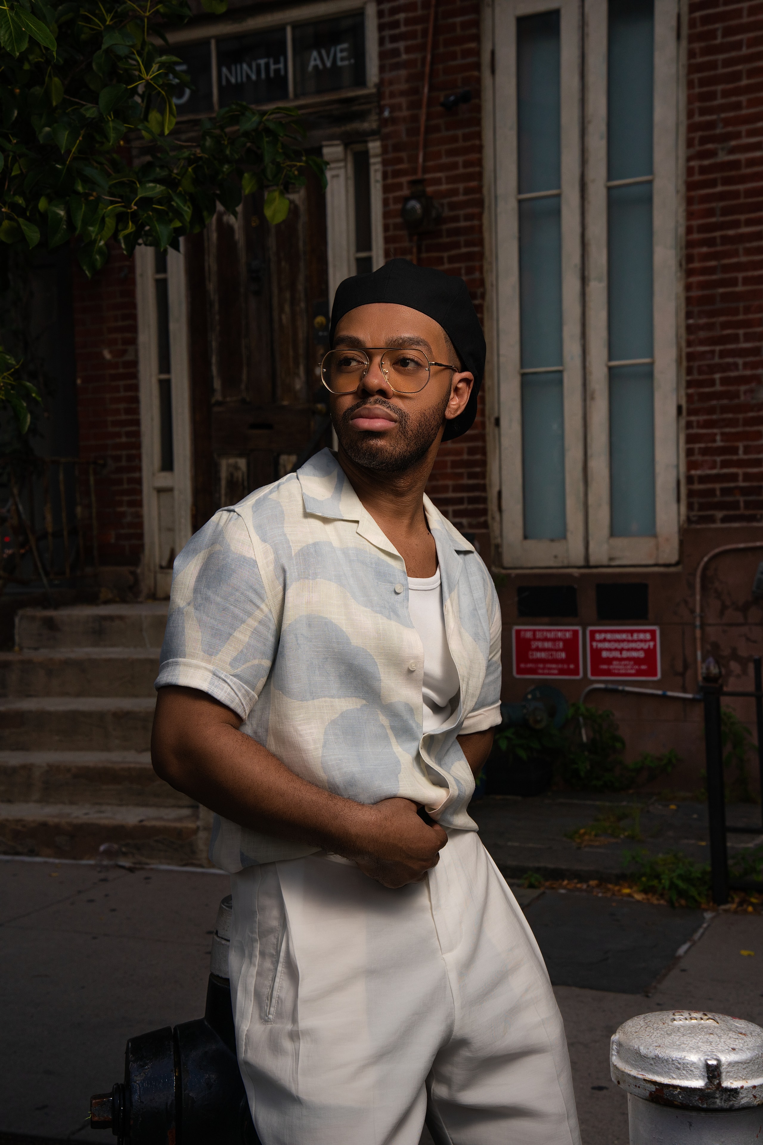 Tristan Holt, founder and designer of LuxeBrim, photographed on a New York street